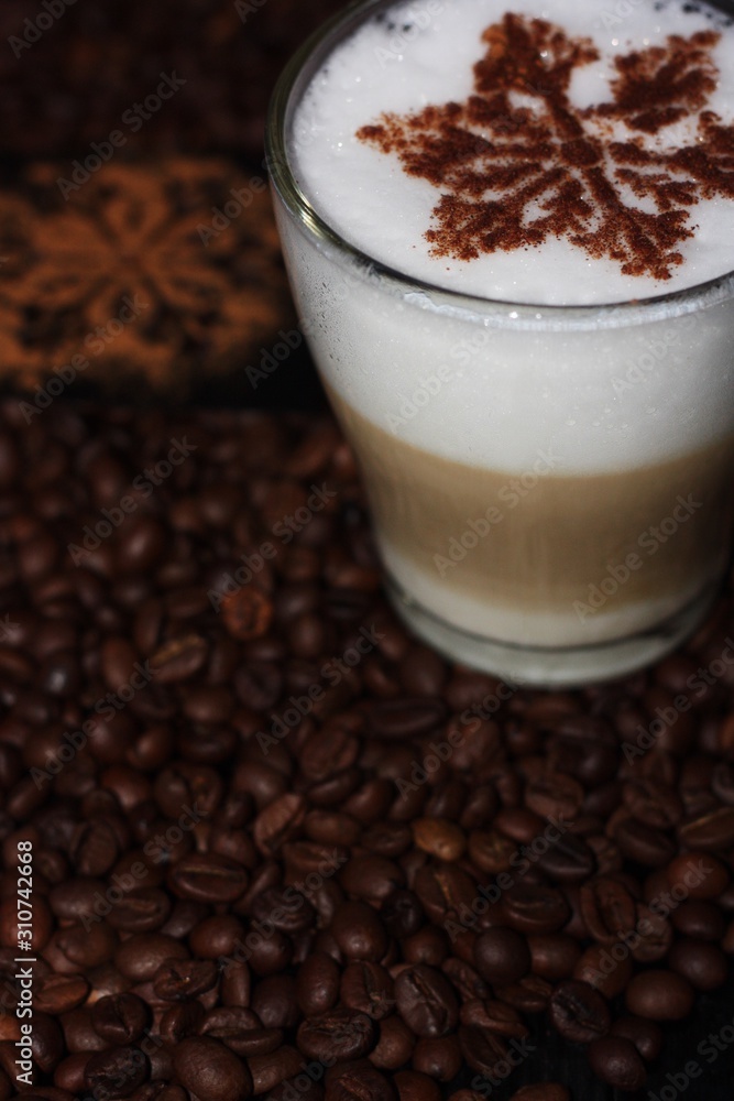 Christmas cappuccino with cinnamon and coffee beans Christmas cappuccino with cinnamon and coffee beans