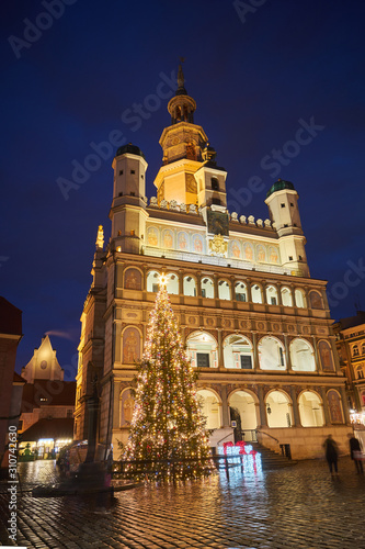 the facade of Renaissance town hall and christmas decorations in city of Poznan.