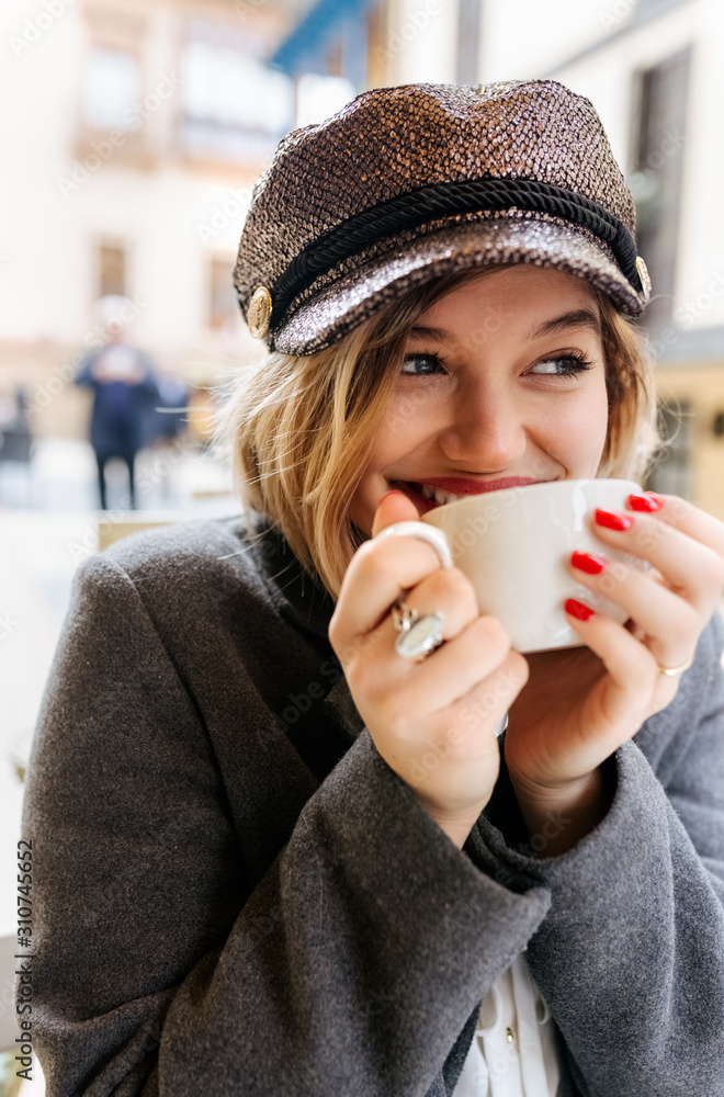Beatiful blond woman at a cafe Beatiful blond woman at a cafe