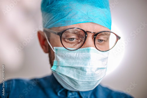 male surgeon doctor in a medical office at work