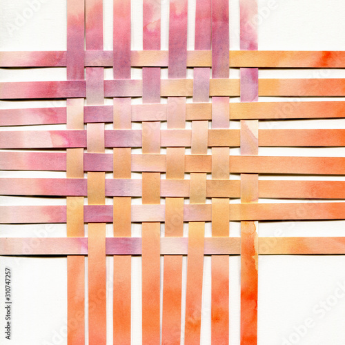 Watercolor woven paper collage in sunset colors pink and orange