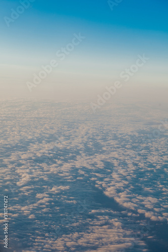 clouds at sunset from the plane in the sky landscape