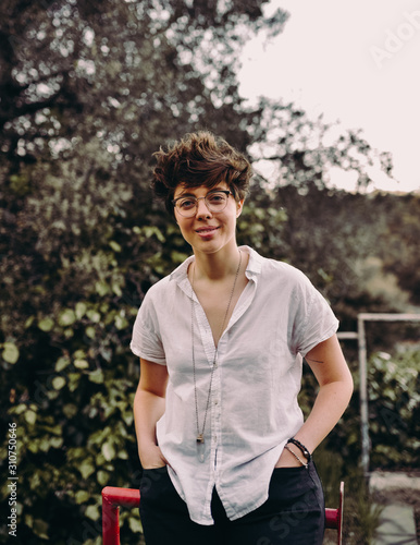 Portrait of young woman with short cute hair photo