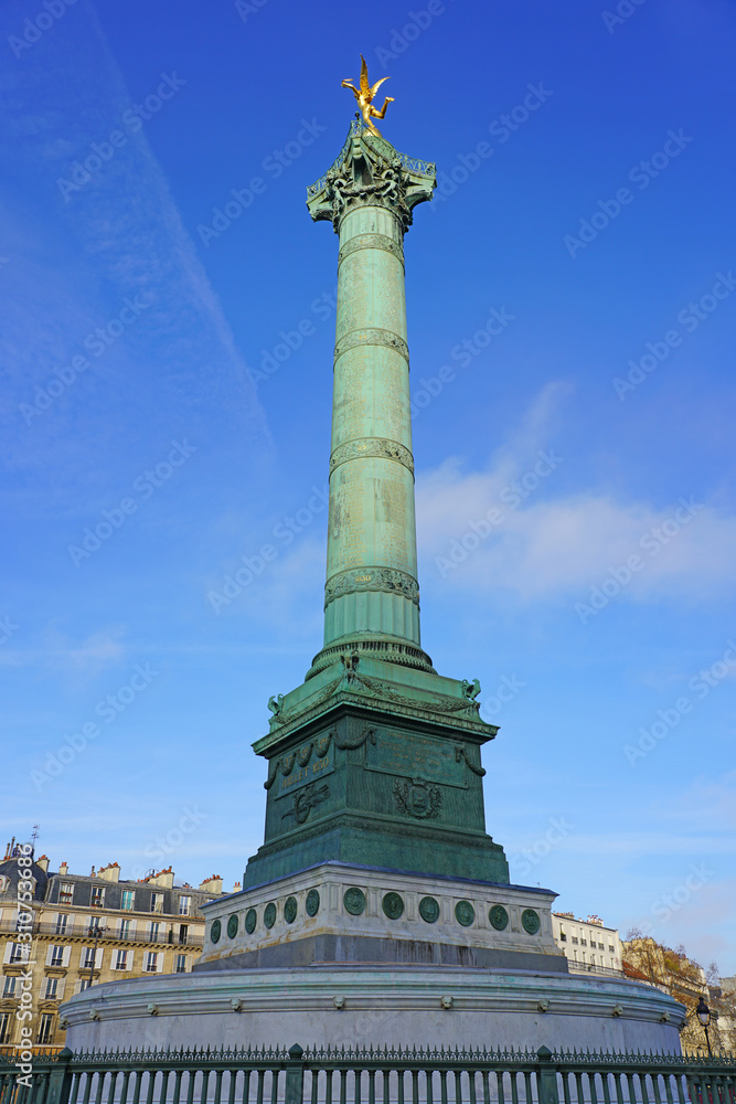 View of the green blue bronze July Column statue on the Place de la Bastille in Paris commemorating the French revolution