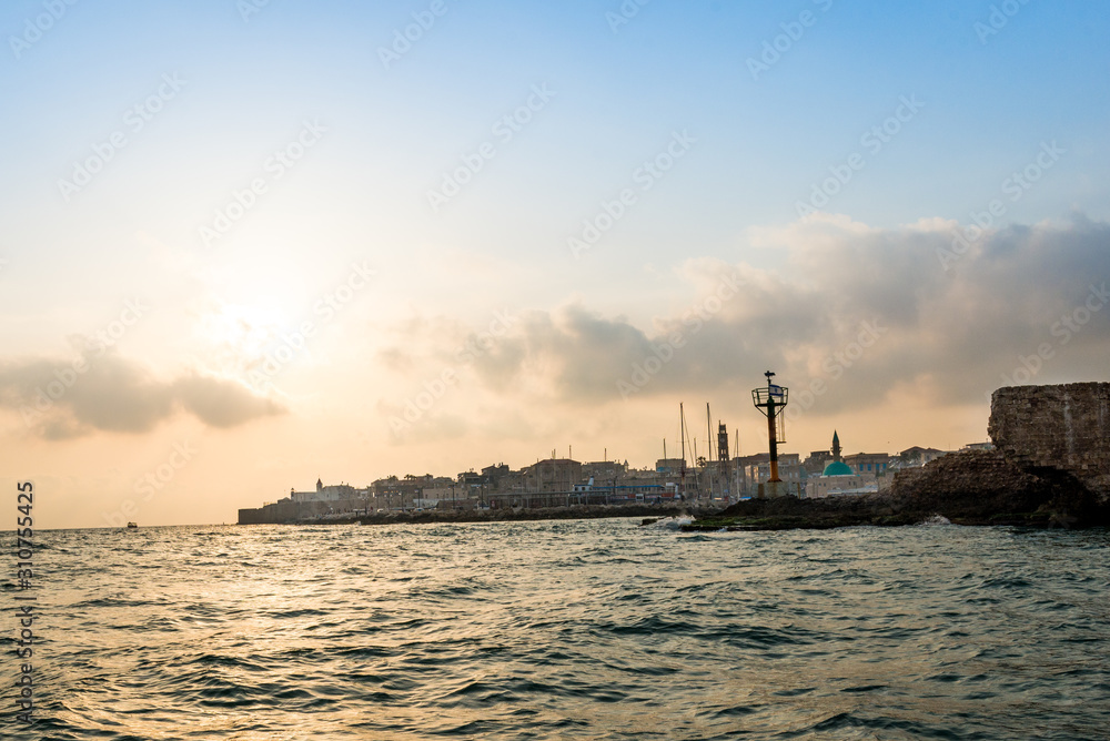 View of the fortification of the old city Akko from boat. Israel.