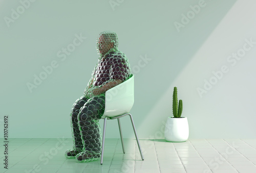 Mature man with bubble wrap sitting on chair indoors