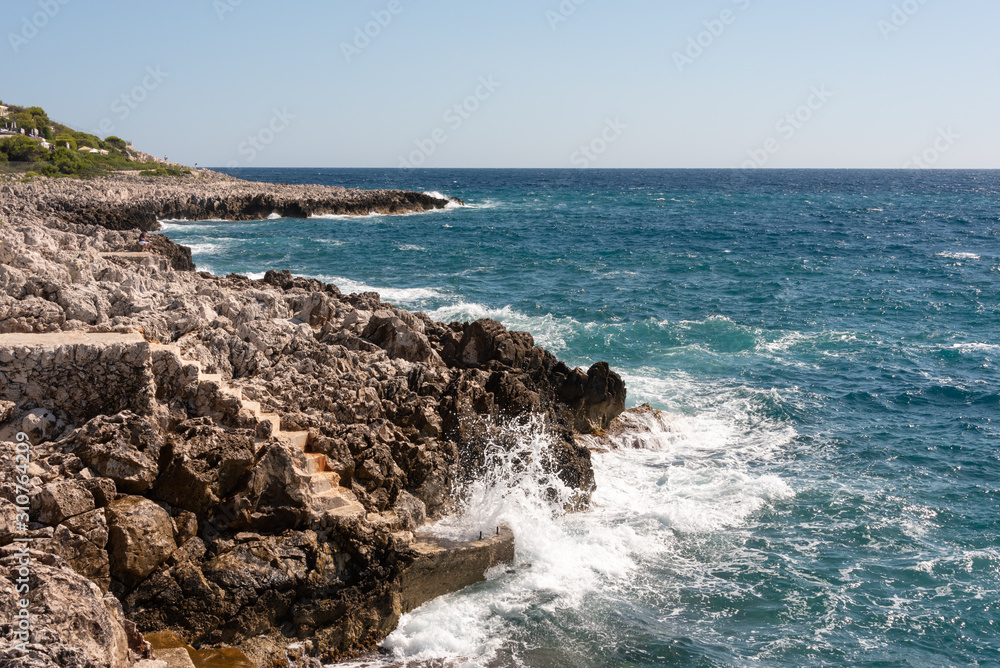 Waves crushing on the rocky shore. Saint Jean Cap Ferrat, south of France. 