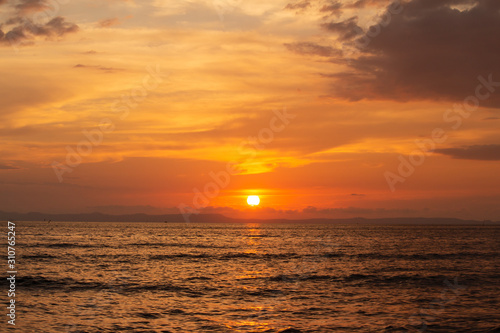 Beautiful sunset at seascape. Beach area in front of Ban Ta Nuak School Khlong Yai Subdistrict  Khlong Yai District  Trat  Thailand 23110.