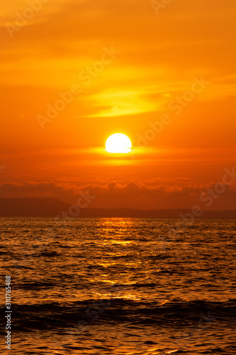 Beautiful sunset at seascape. Beach area in front of Ban Ta Nuak School Khlong Yai Subdistrict  Khlong Yai District  Hong Kong  Trat  Thailand 23110