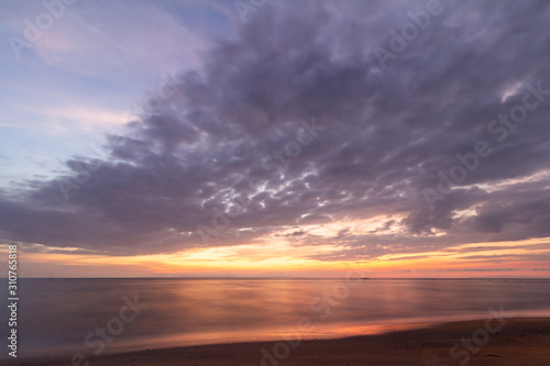 Beautiful sunset at seascape. Beach area in front of Ban Ta Nuak School Khlong Yai Subdistrict, Khlong Yai District, Hong Kong, Trat, Thailand 23110