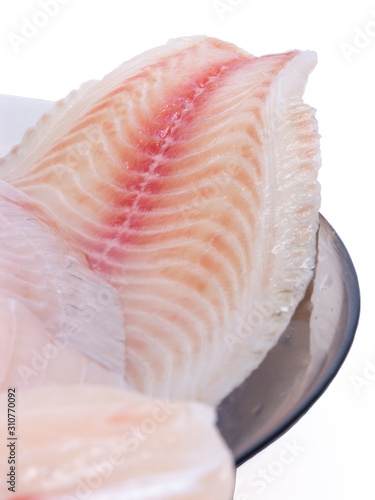 Raw fillets fish. Fresh and healthy food on isolated white background.