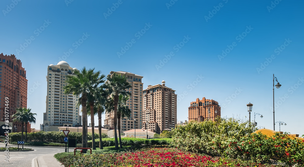 Fototapeta premium Beautiful central district near the Pearl Boulevard in artificial island The Pearl-Qatar in Doha