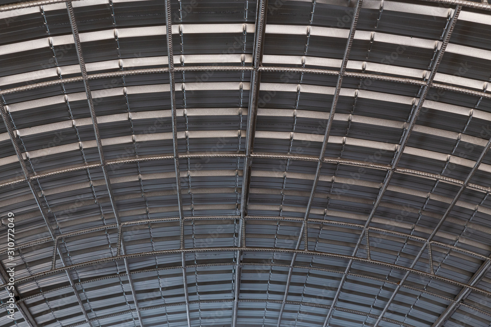 Roof top of industrial, roof structures of industrial building. Structural of roof industrial. Background and texture of steel structures and light bulb. Roof top of industrial, roof structures of industrial building. Structural of roof industrial. Background and texture of steel structures and light bulb.