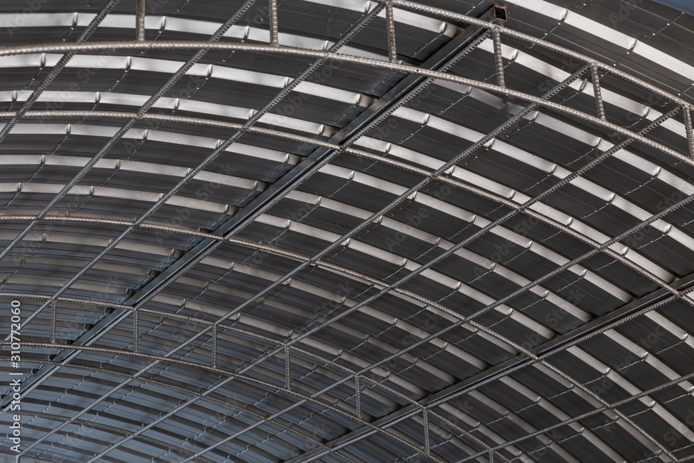 Roof top of industrial, roof structures of industrial building. Structural of roof industrial. Background and texture of steel structures and light bulb. Roof top of industrial, roof structures of industrial building. Structural of roof industrial. Background and texture of steel structures and light bulb.