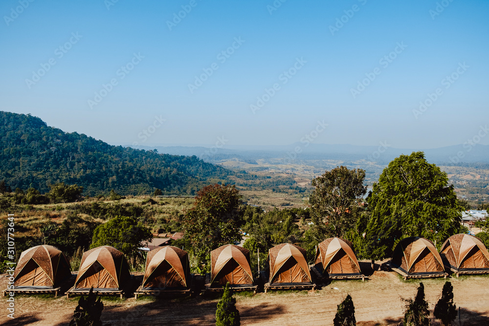 Scenic View Of Camping And Mountains  Against Blue Sky