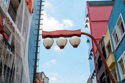 Red japanese themed light pole. Lampposts of Liberdade neighborhood at Sao Paulo, Brazil.