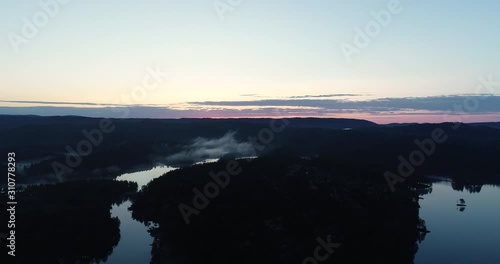 Aerial viev of  peaceful morning dawn, before sunrise over the lake in south Norway. (Gåseflå). photo