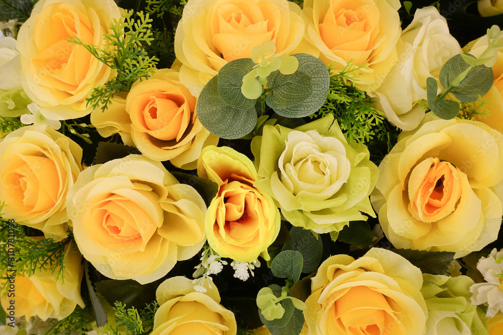 Fake flower and Floral background. rose flowers made of fabric. The fabric flowers bouquet. Fake flower and Floral background. rose flowers made of fabric. The fabric flowers bouquet.