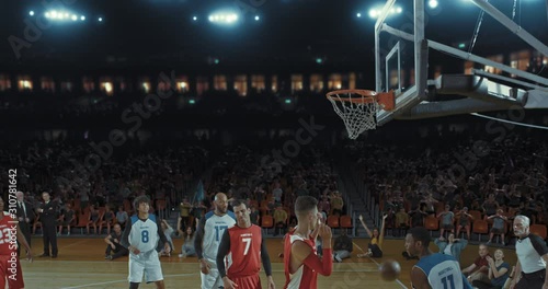 Wallpaper Mural Basketball players on big professional arena during the game. Tense moment of the game. Celebration Torontodigital.ca