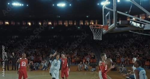 Wallpaper Mural Basketball players on big professional arena during the game. Tense moment of the game. Celebration Torontodigital.ca