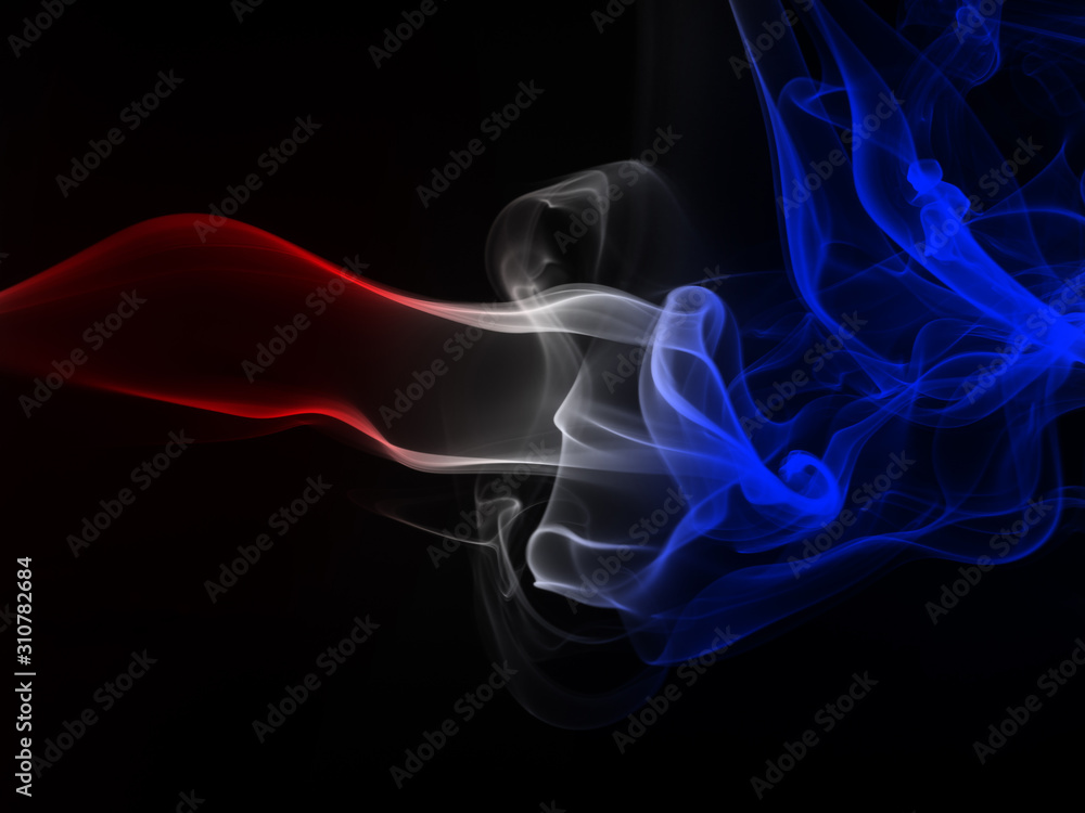 Fototapeta premium fire of colorful smoke abstract on black background for design