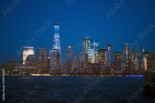 Nighttime view of the waterways of lower Manhattan and the World Financial Center from Liberty State Park in Jersey City  New Jersey -03