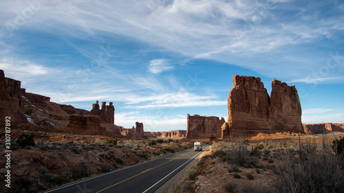 View in Arches National Park viewing the desert landscape of the Three Sisters, Tower of Babel, and The Organ.