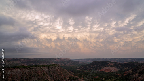 Sunset over Palo Duro Canyon in Texas viewing mammatus with vibrant color in the sky.