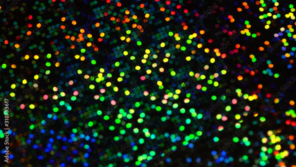 Holographic multicolor digital mosaic pixels. Abstract moving holiday background. The texture of a real surface Holographic multicolor digital mosaic pixels. Abstract moving holiday background. The texture of a real surface