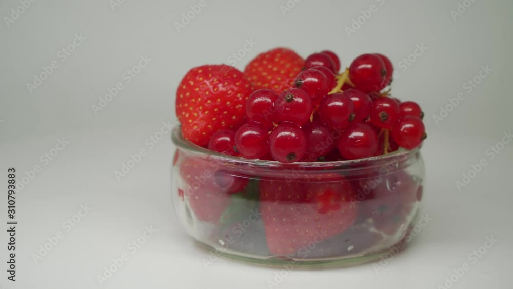 Strawberries And Grapes Inside The Glass Bowl Looks Delicious - Close Up Shot Strawberries And Grapes Inside The Glass Bowl Looks Delicious - Close Up Shot