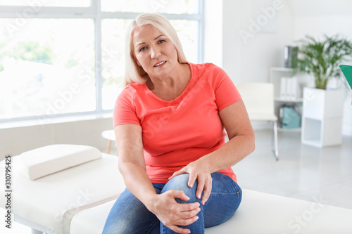 Mature woman suffering from...