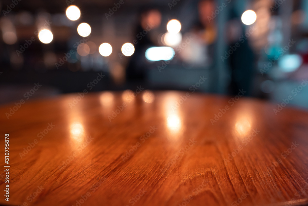 Mahogany wood table surface in warm luxury style cafe. Mahogany wood table surface in warm luxury style cafe.
