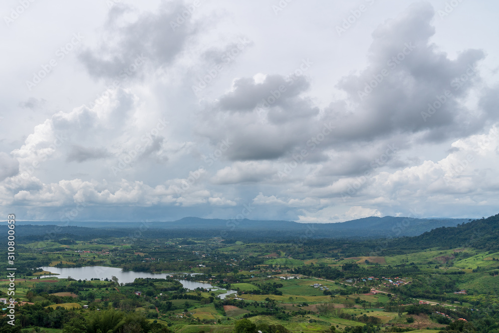 Obraz premium beautiful blue sky high peak mountains mist fog wildlife green forest at Khao Koh, Phu Tub Berk, Phetchabun, Thailand guiding idea long weekend for backpacker camping campfire relaxing hiking