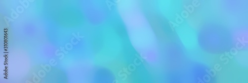 blurred bokeh horizontal background with corn flower blue, baby blue and medium turquoise colors and free text space