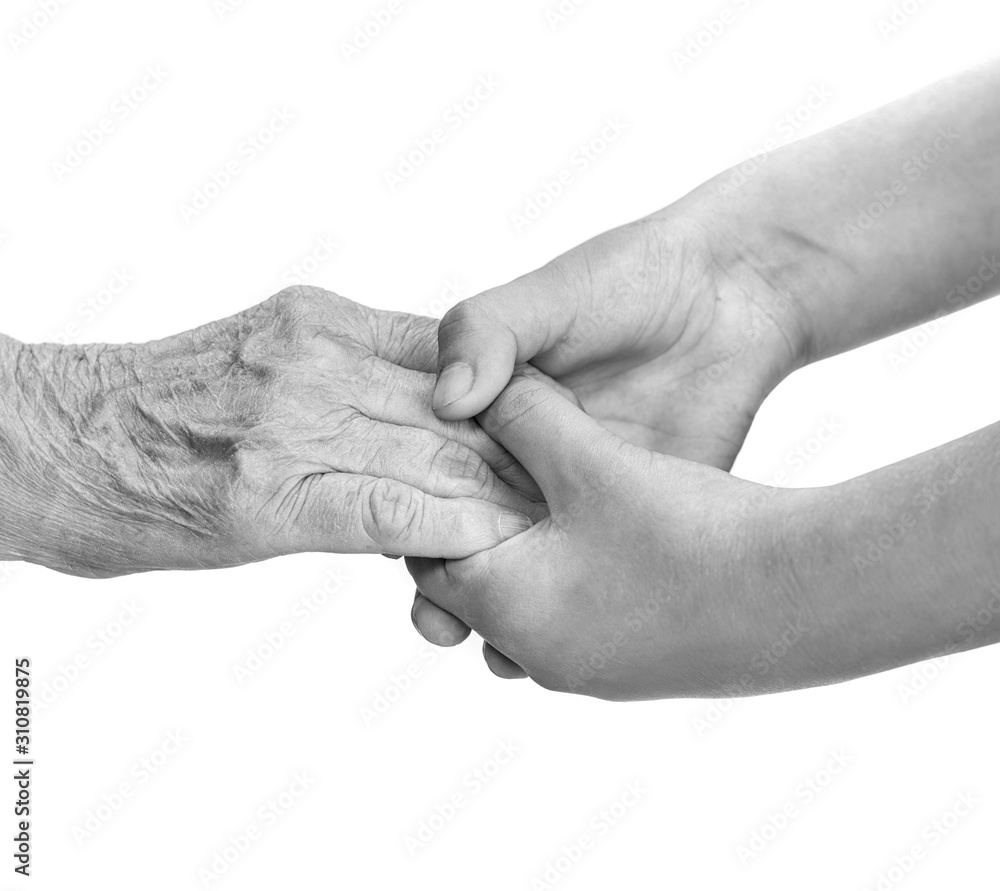 Fototapeta premium Senior woman and young girl holding hands