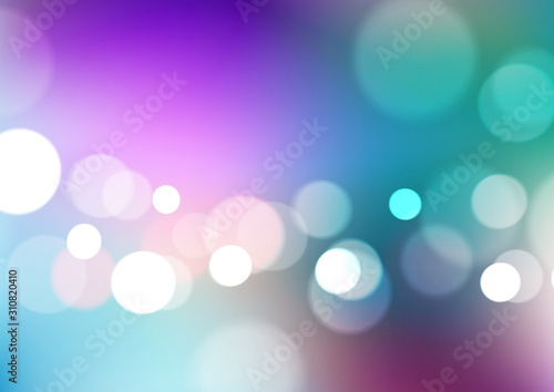 Abstract bokeh lights on blurred colors background