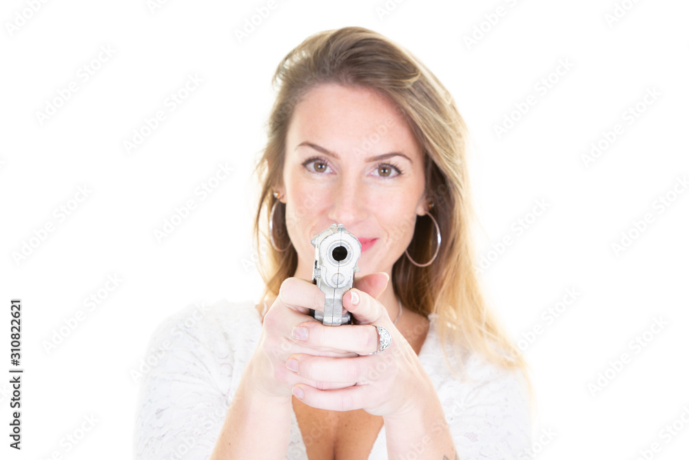 Portrait of an attractive blonde woman silver gun in hands Portrait of an attractive blonde woman silver gun in hands
