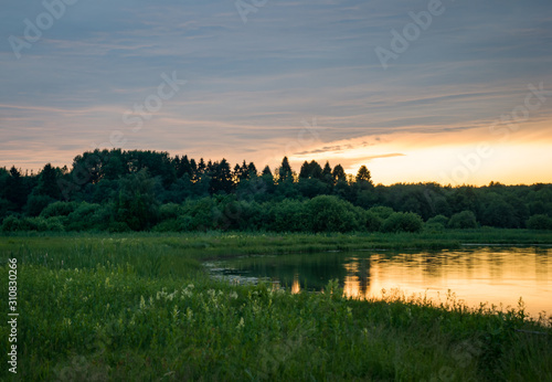 Summer colorful landscape - sunset and river
