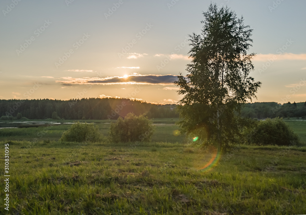 Fototapeta premium Summer colorful landscape - sunset and river