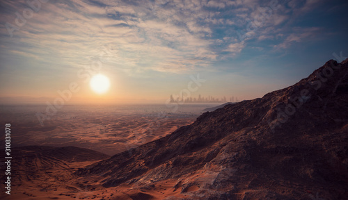 Dubai Desert Mountain Sunrise - mountains are silhouetted in this dramatic hatta sunrise. 