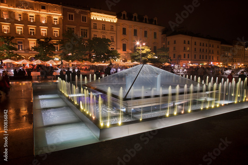 Fountain at Market square in Krakow. Poland