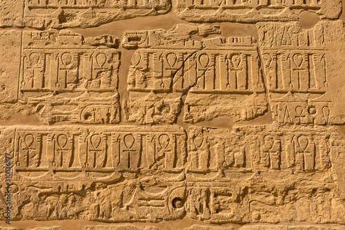 Karnak Temple, Temple Ruins, Embossed hieroglyphics on columns. Great Hypostyle Hall.