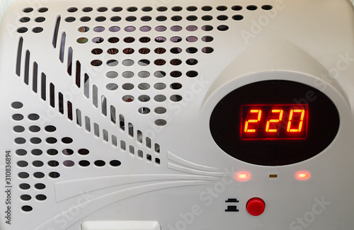 Bilde på lerret Gray stabilizer of the voltage with black display
