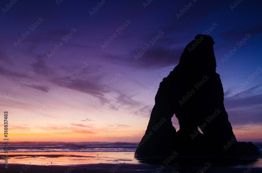 Sunset over ocean and sea stacks