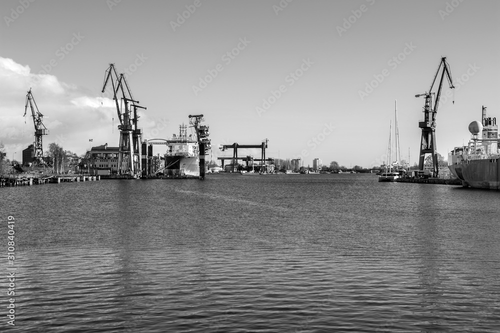 Big cranes and dock at the shipyard. Gdansk, Poland Big cranes and dock at the shipyard. Gdansk, Poland