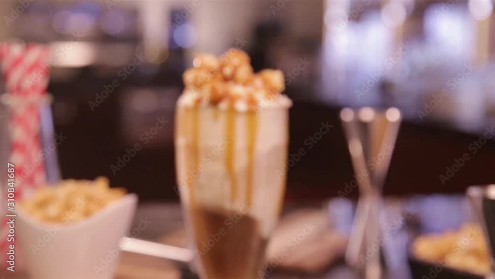 Ice Cream Drinks with Popcorn and Caramel Topping - Zoom In Ice Cream Drinks with Popcorn and Caramel Topping - Zoom In