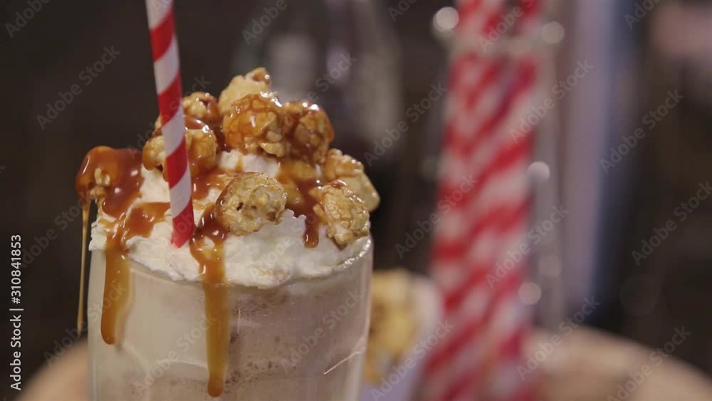 Liquid Caramel Topping on Popcorn - Pull Focus Liquid Caramel Topping on Popcorn - Pull Focus
