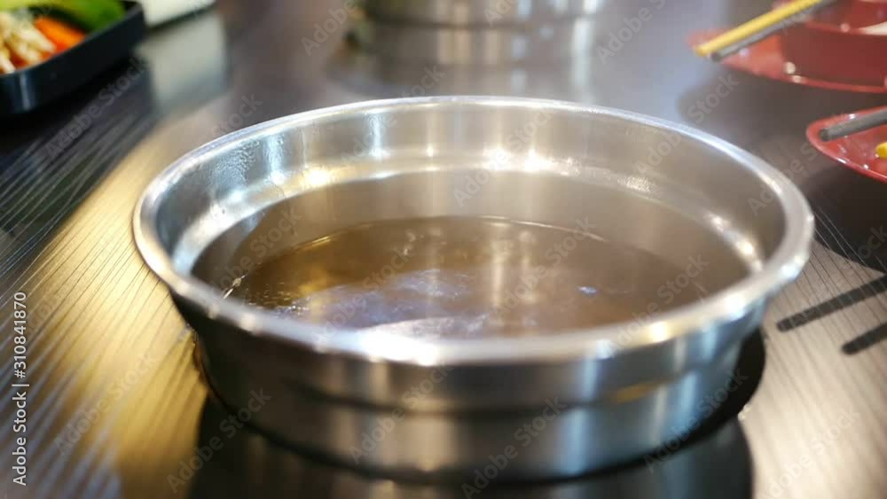 Shabu in hot pot at restaurant Shabu in hot pot at restaurant