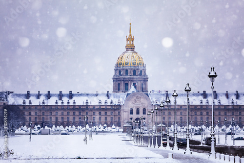 Invalides building on winter snow day in Paris © Sergey Novikov