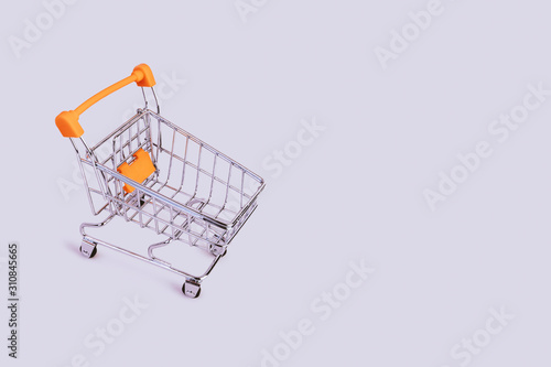 Banner with shopping cart. Grocery shopping and sale concept. Black friday, online shopping and store concept. Sale discount. Business background with copyspace. Creative design. Stock photography.